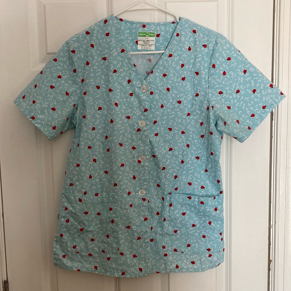 HealthPro Light Blue Ladybug Button-Up Scrub Top